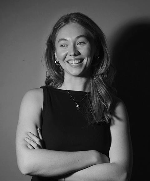 Aleah Kamerman speaking at a podium at RRC Polytech